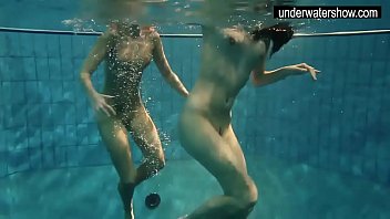 Underwater naked girls swirling around